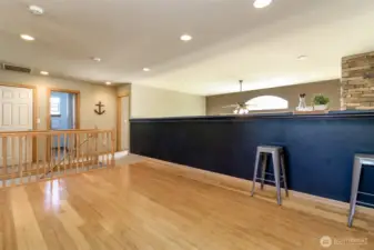 Loft half wall with counter space. This overlooks the family room.