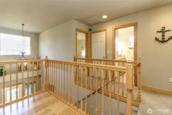 The open door in the corner is the second extra bedroom. The third bedroom is to the right of this pictiure.