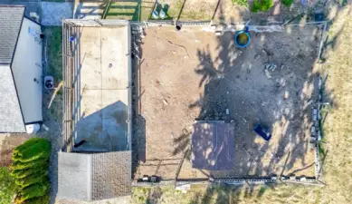 This aerial view is of the covered house and dog run and the turkey/chicken house and pen.