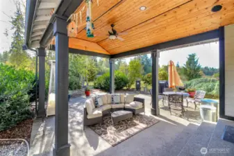 Lovely covered patio with ceiling fan and wired for speakers.