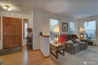 Spacious entryway to living room and up to stairs or back to kitchen and family room. Home flows well for all your lifestyle needs