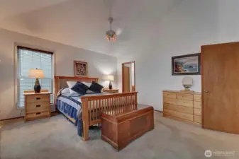 Primary Bedroom Suite, entry with double doors.  Private bathroom with tub and shower off to the right