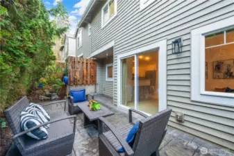 Large stamped concrete patio with easy access to kitchen