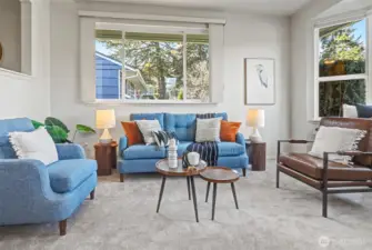 As you walk in, you're greeted by this lovely living room which is separated from the dining room and kitchen.