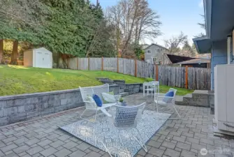 The kitchen has a door that leads to this awesome patio.