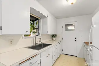 Plenty of space for food prep & lots of cupboards.