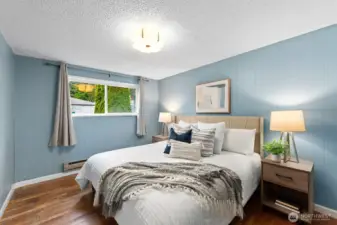 This bedroom fits a King sized bed nicely.