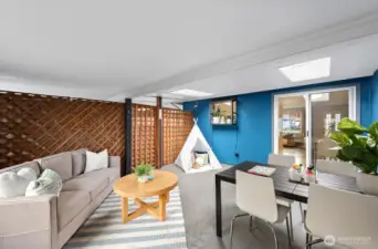 The exterior porch space has two skylights and is 'walled' on all sides.