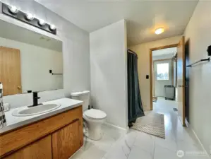Main Bathroom to Laundry Room / Kitchen