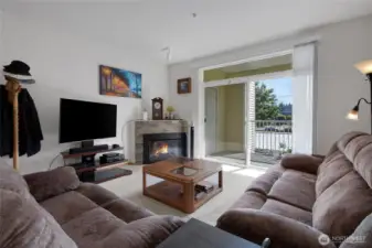 Inside living room with patio/deck off slider area