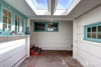 The enclosed patio - the laundry room can be viewed through the window on the right