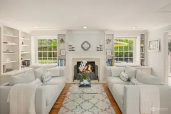 Satin white millwork and extensive built-ins create an elegant and warm ambiance.