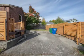 Driveway leads to 1-car garage with EV charging capabilities.