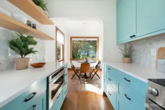 Dining space connects the living room to the tastefully update kitchen.