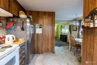 Kitchen looking towards dining room and hallway to bedrooms