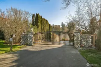 Private gate only for 5 homeowners down this driveway- This exceptional home offers unparalleled scenery, modern comforts, and the perfect setting to unwind.