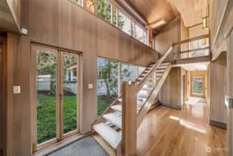 Custom built home designed to showcase it's natural beauty & exceptional quality. Featuring gorgeous cedar paneling throughout, traffic flows easily through the front to the rear hall, and open stairway keeps the view of the beach intact. Hydronic radiant baseboard heat throughout this home.