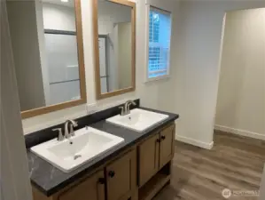 Primary bath with double vanities.