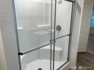 Walk in shower in primary bath.