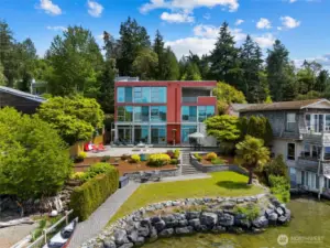 This stunning west-facing Lake Washington residence offers refined modern living in one of the Eastside’s most desirable waterfront enclaves.