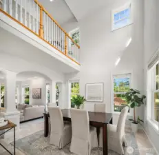 Gorgeous dining room with vaulted ceiling.