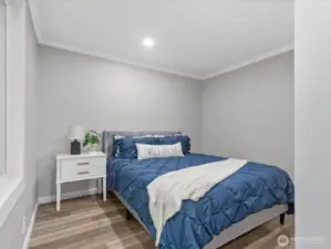main floor bedroom 1 (off smaller living room)