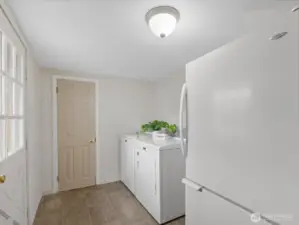 mudroom / laundry room / dry storage (through door on far wall)