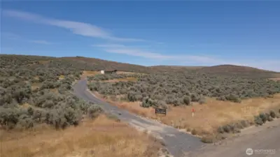 Entrance to the private driveway to property.