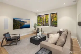Media room system boasting an 85” Samsung 4K QLED television and Sonos surround sound system