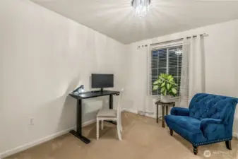 Third upper bedroom, ideal for guest room, office, or creative space.