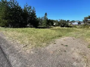 This large lot is ready for you. Enjoy the sunsets sitting on the canal and hear the ocean surf.