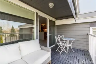 An ideal outdoor sanctuary for morning coffee or evening cocktails