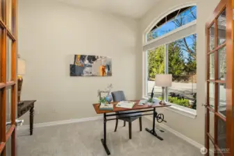 Just off the entry, a private home office with French doors and 240V outlets is ready for whatever you bring to it.    Just off the entry, a private home office with French doors and 240V outlets is ready for whatever you bring to it.