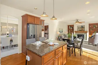 Open, bright, and connected — the kitchen, dining, and family room flow together beautifully.