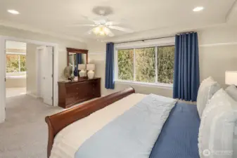 This private retreat features elegant double doors leading to the ensuite bath and TWO well-appointed walk-in closets.