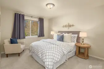 The fourth upper-level bedroom impresses with a spacious walk-in closet.