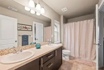 Jack & Jill bath between 2nd and 3rd bedrooms