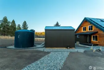 2500 gallon cistern next to wellhouse.