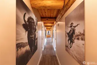 Hallway from mudroom leading  to bedrooms and bathroom.