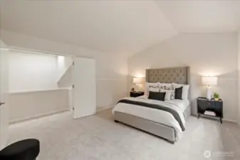 Primary suite with vaulted ceilings