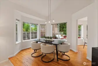 Formal dining room with hardwood floors