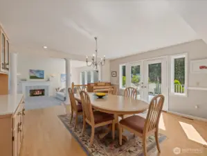 Dining connects to the Kitchen & Living Room with French doors out to the large Deck.