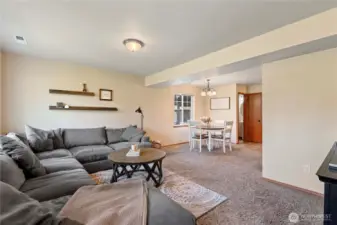 Open concept living to dining to kitchen on main level