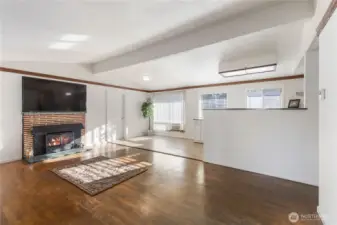 Original hardwood floors, and a really nice wood fireplace. Imagine a cold winter night, sitting on your couch enjoying the crackle of the fire, beverage in hand. It's a mood!