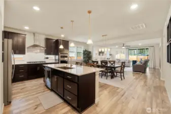 Gourmet kitchen with large center island and ample cabinets