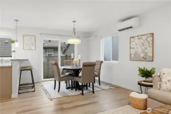 Bright cheery dining space with access to back patio and yard.
