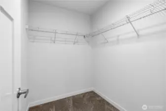Primary walk in closet.