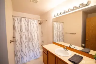 Primary bathroom with a full tub & shower.