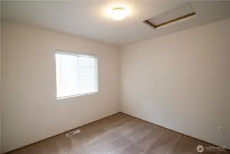 Second bedroom with beautiful morning sunlight.