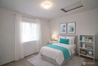 Virtually staged inviting second bedroom.